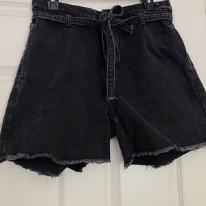 Black denim shorts.